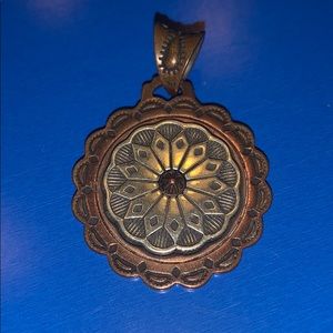 K J and copper pendant